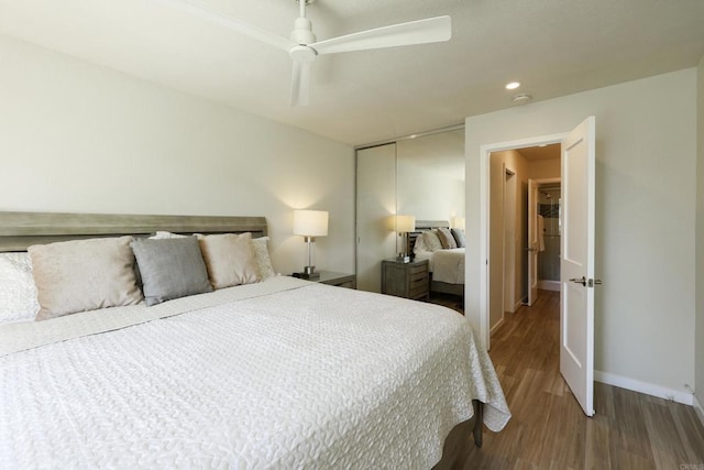 999 N Pacific St Unit E108, Oceanside, CA 92054 - bedroom with recessed lighting, wood finished floors, a closet, baseboards, and a ceiling fan