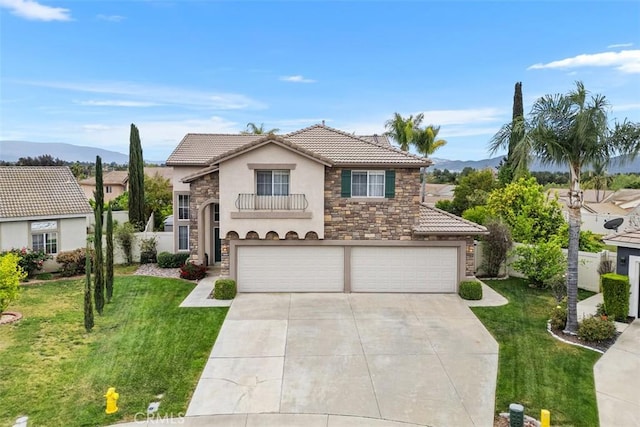 view of front of house with a tile roof, a front lawn, an attached garage, concrete driveway, and stucco siding