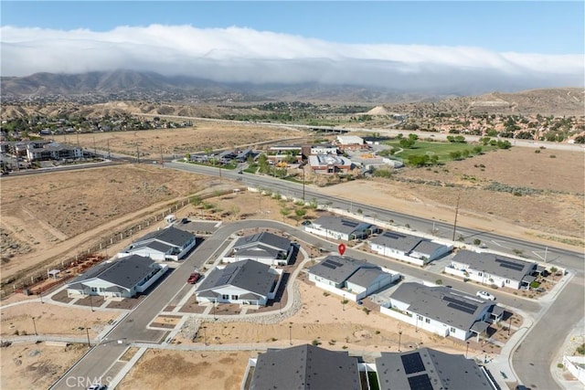 aerial view with a mountain view and a residential view