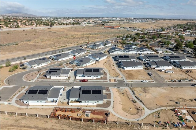birds eye view of property with a residential view and a mountain view