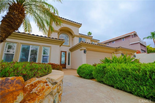 29515 Longhorn Dr, Canyon Lake, CA 92587 - mediterranean / spanish house featuring stucco siding and an attached garage