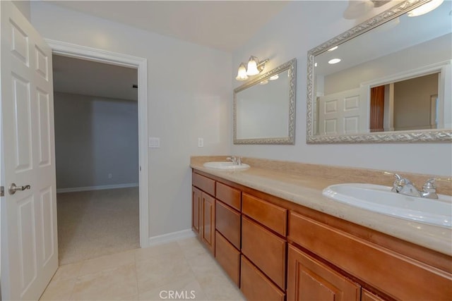 29515 Longhorn Dr, Canyon Lake, CA 92587 - full bathroom with double vanity, tile patterned floors, and baseboards