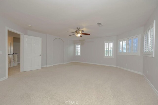 29515 Longhorn Dr, Canyon Lake, CA 92587 - spare room featuring light carpet, a ceiling fan, and baseboards
