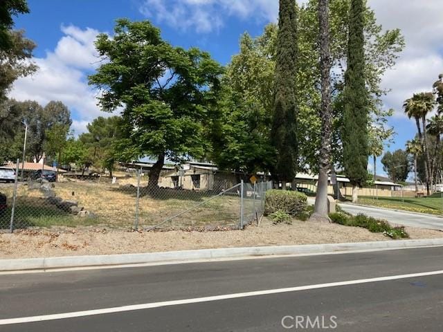 29515 Longhorn Dr, Canyon Lake, CA 92587 - view of front of home featuring fence