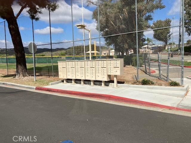29515 Longhorn Dr, Canyon Lake, CA 92587 - surrounding community featuring mail area and fence