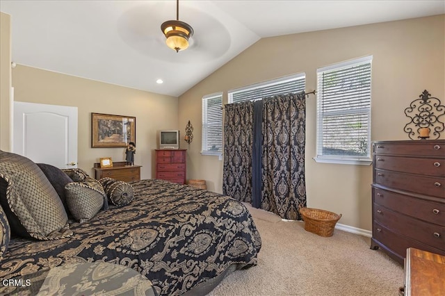 bedroom featuring lofted ceiling, baseboards, ceiling fan, and carpet
