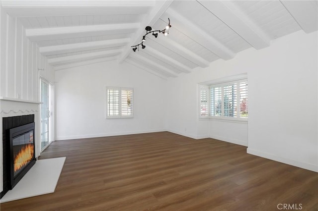 unfurnished living room featuring a fireplace, dark wood finished floors, and plenty of natural light