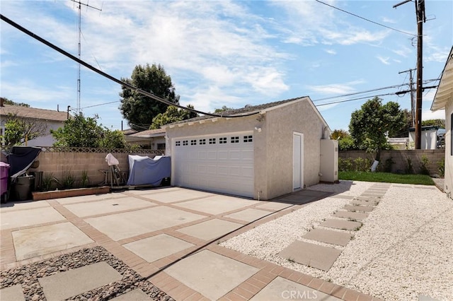 detached garage with fence