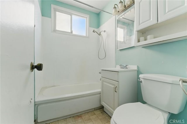 bathroom with toilet, shower / washtub combination, and vanity