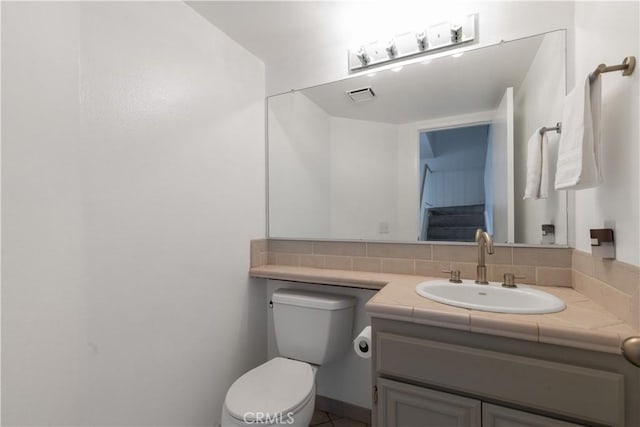 983 Elsa Ct Unit D, Corona, CA 92881 - bathroom featuring visible vents, toilet, and vanity