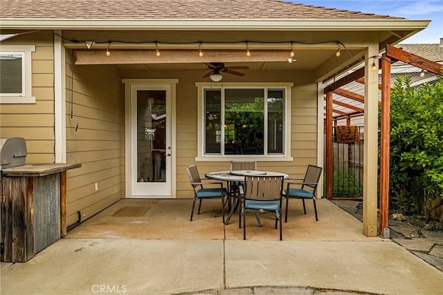 view of patio / terrace featuring ceiling fan and outdoor dining space