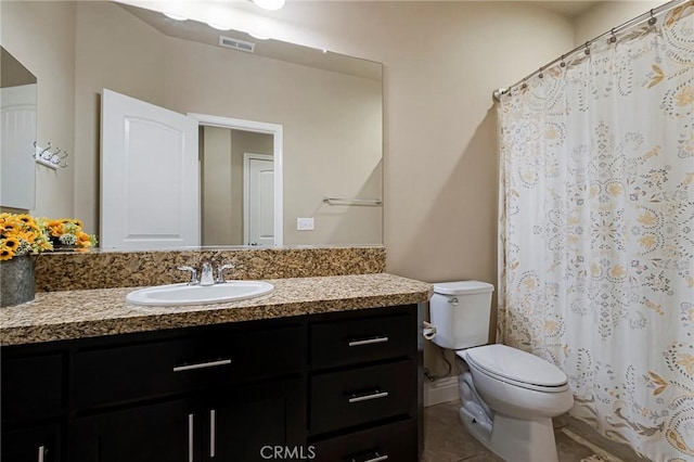 full bathroom featuring a shower with curtain, visible vents, tile patterned flooring, vanity, and toilet