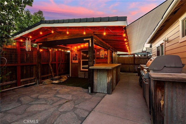 patio terrace at dusk with fence