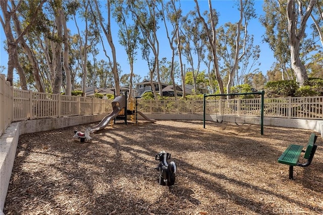 view of playground with fence