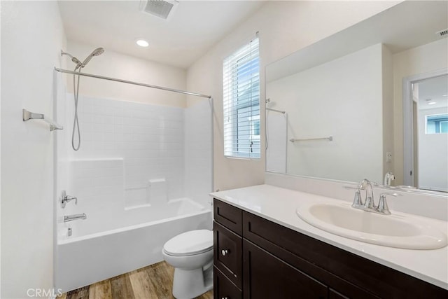 9126 Foster Ln, Chatsworth, CA 91311 - full bath with vanity, toilet, wood finished floors, and  shower combination