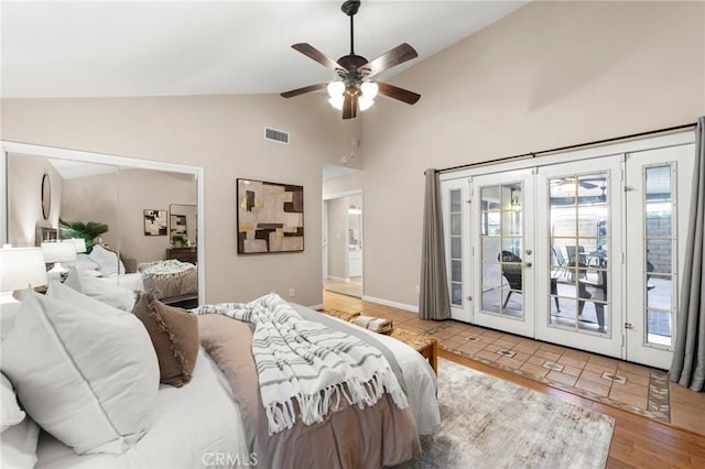 bedroom featuring access to exterior, ceiling fan, visible vents, french doors, and high vaulted ceiling