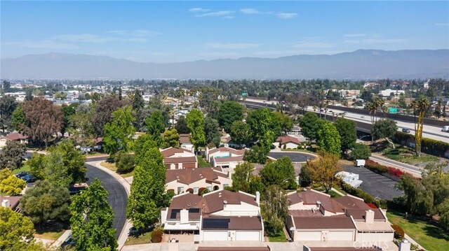aerial view with a mountain view and a residential view