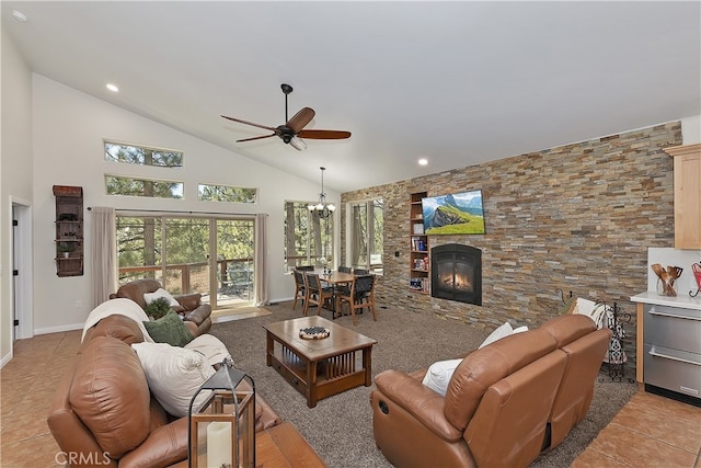 39080 Waterview Dr, Big Bear Lake, CA 92315 - living area featuring a ceiling fan, a chandelier, a fireplace, high vaulted ceiling, and baseboards