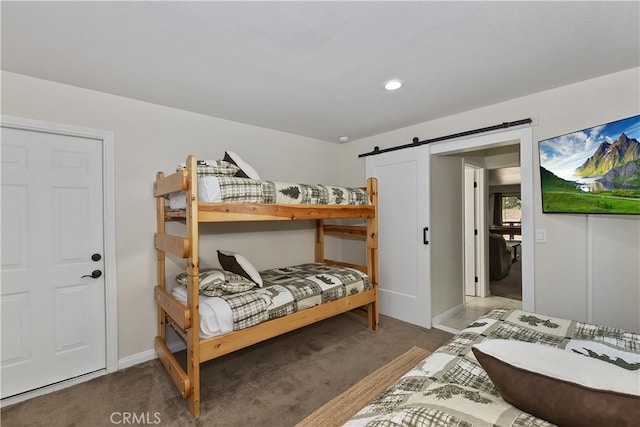 39080 Waterview Dr, Big Bear Lake, CA 92315 - bedroom featuring carpet, a barn door, and baseboards