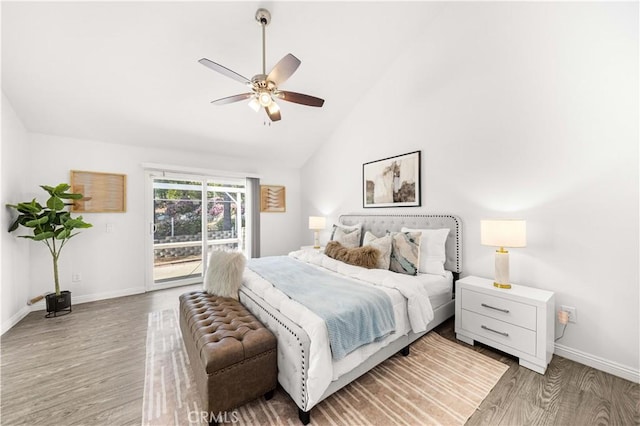 bedroom featuring access to outside, baseboards, a ceiling fan, and light wood-style floors