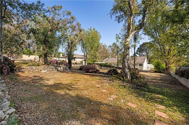 view of yard with fence