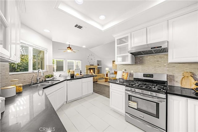 kitchen with visible vents, under cabinet range hood, stainless steel range with gas stovetop, a sink, and dishwasher