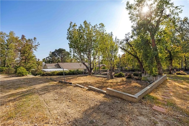 view of yard with fence