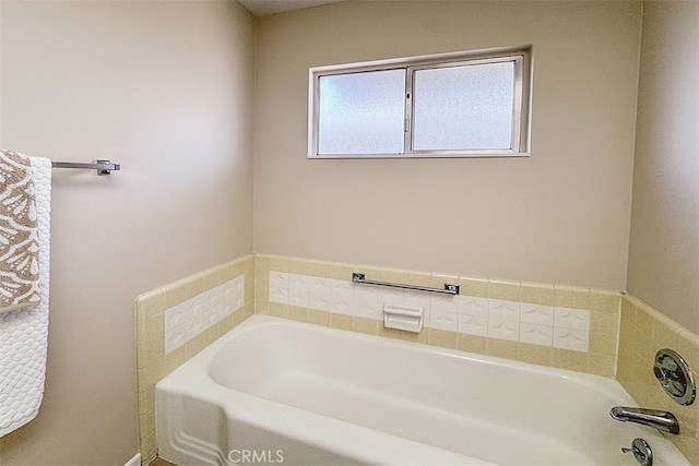 bathroom featuring a garden tub