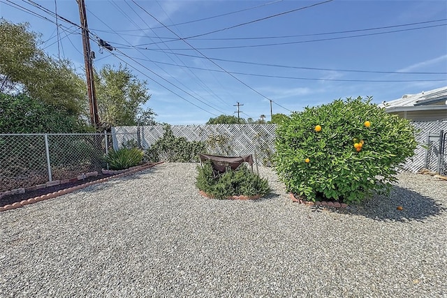 exterior space with a fenced backyard