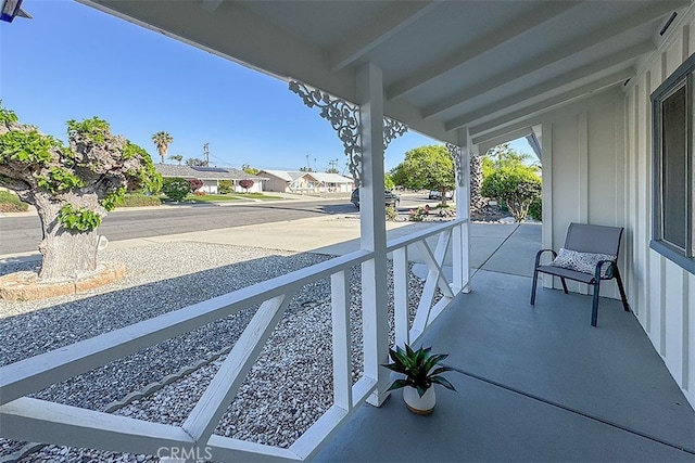 balcony with a porch and a residential view