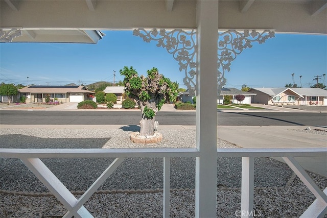 view of yard featuring a residential view