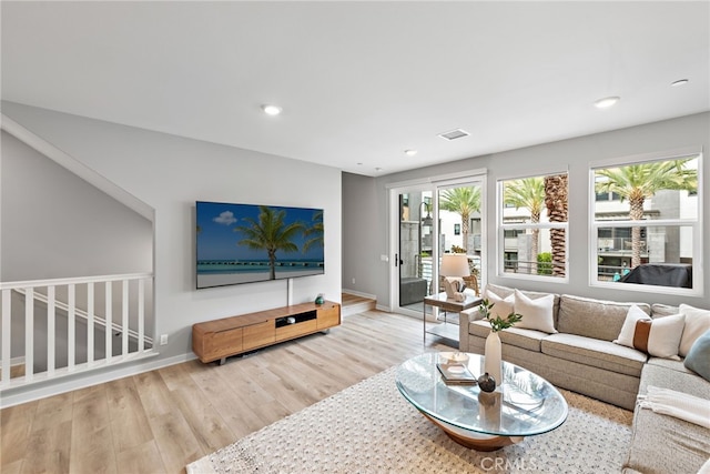 845 S Grable Cir, Orange, CA 92868 - living area featuring wood finished floors, recessed lighting, visible vents, and baseboards
