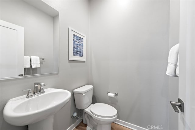 845 S Grable Cir, Orange, CA 92868 - bathroom featuring wood finished floors, toilet, and a sink