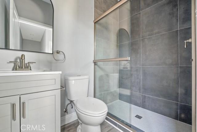 22020 Pioneer Blvd Unit A & B, Hawaiian Gardens, CA 90716 - bathroom with vanity and a shower stall