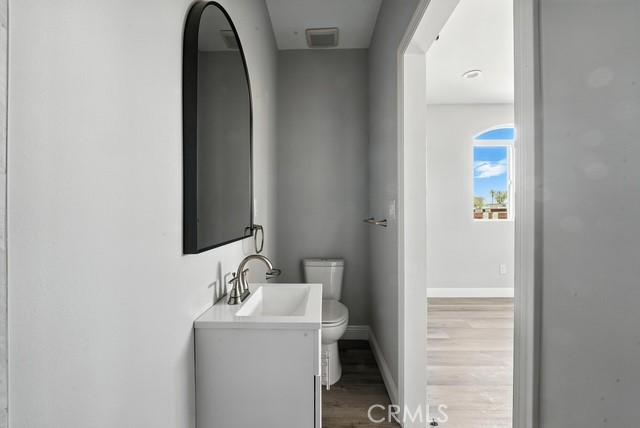 22020 Pioneer Blvd Unit A & B, Hawaiian Gardens, CA 90716 - bathroom with vanity and wood finished floors