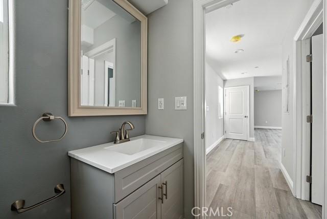 22020 Pioneer Blvd Unit A & B, Hawaiian Gardens, CA 90716 - bathroom with vanity and wood finished floors