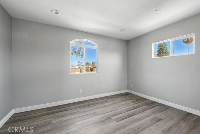 22020 Pioneer Blvd Unit A & B, Hawaiian Gardens, CA 90716 - empty room with plenty of natural light and wood finished floors