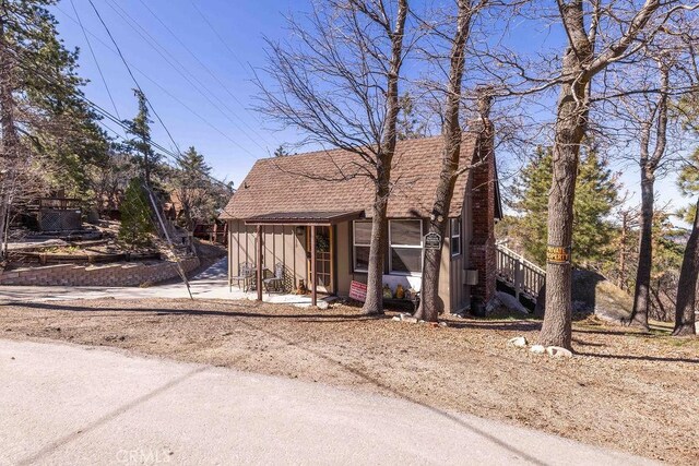 32950 Canyon Dr, Green Valley Lake, CA 92341 - view of front of property featuring a chimney