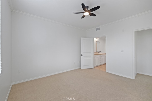 unfurnished bedroom with baseboards, visible vents, ornamental molding, and light carpet