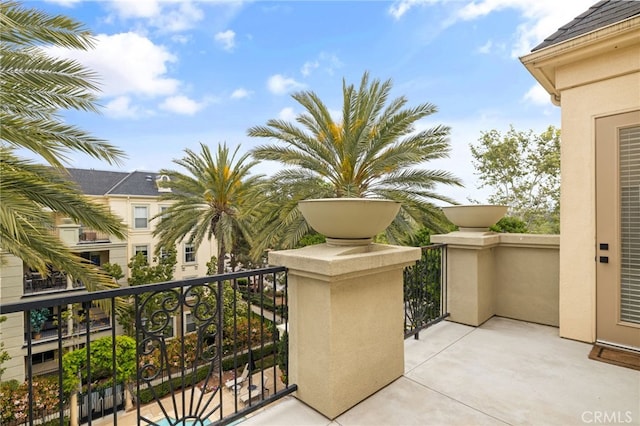 view of patio with a balcony