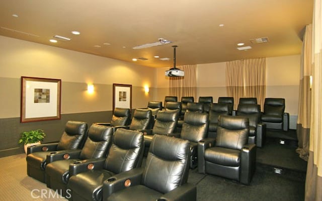home theater room with carpet flooring, recessed lighting, and visible vents