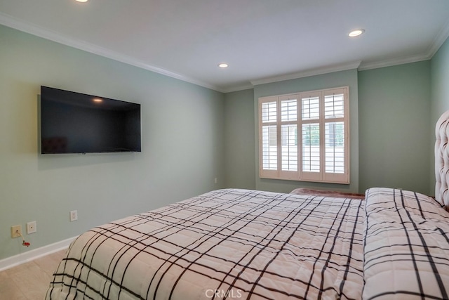 bedroom featuring crown molding, baseboards, recessed lighting, and wood finished floors
