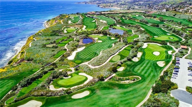 aerial view with a water view and golf course view
