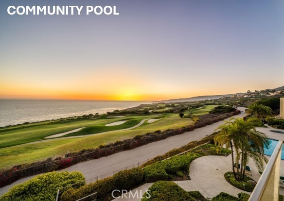 view of property's community with a water view and golf course view