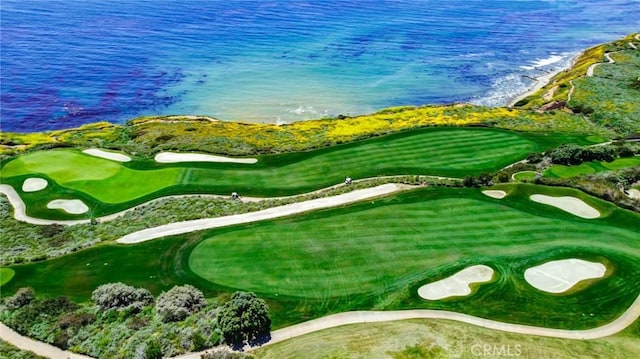 view of community featuring a water view and golf course view