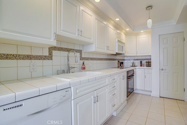 kitchen with a sink, white cabinetry, light tile patterned floors, and black appliances