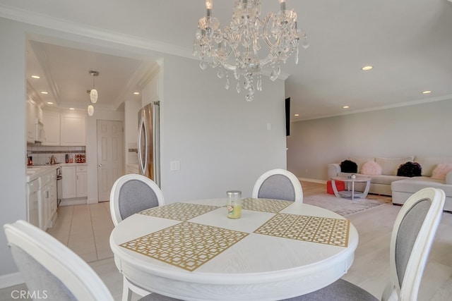 dining space featuring crown molding, recessed lighting, and an inviting chandelier