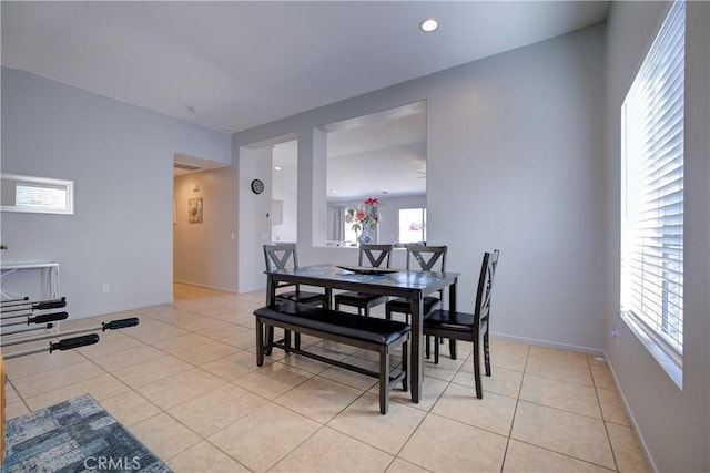 dining area with light tile patterned floors