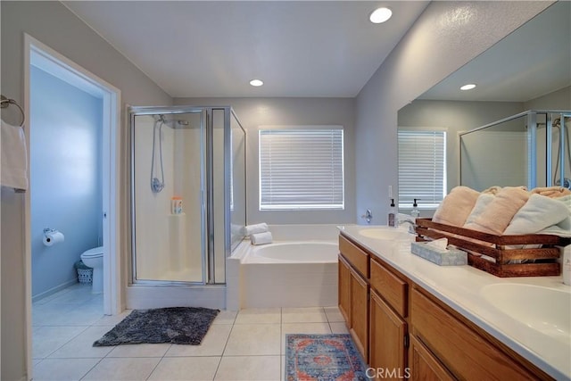 full bath with a stall shower and tile patterned floors