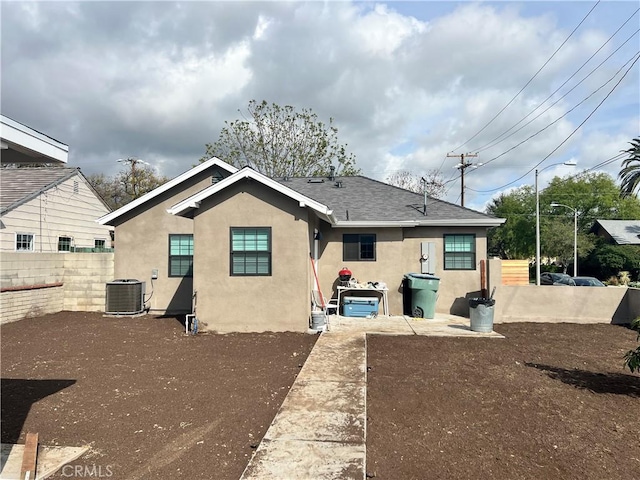 1941 Mentone Ave, Pasadena, CA 91103 - back of property with fence, stucco siding, roof with shingles, and central air condition unit